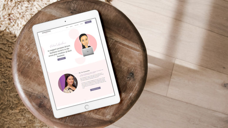 a mockuo of the website of Samantha J Flynn on a tablet on top of a cround offee table